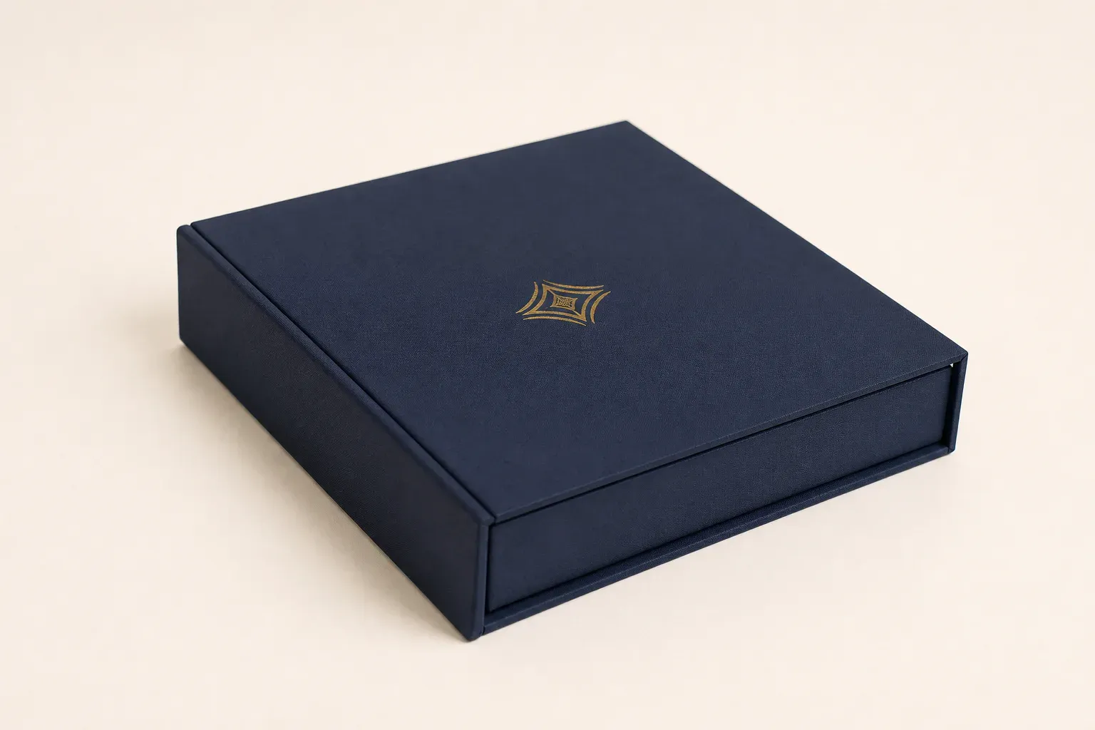 Custom booklet box side view showing rigid board depth and wrapped paper edges