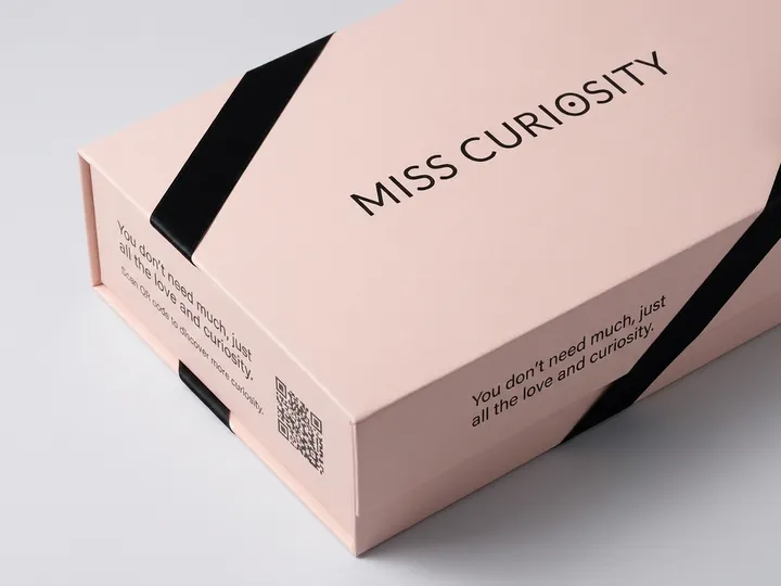 Pale pink matte laminated bra gift box with raised blind embossed branding