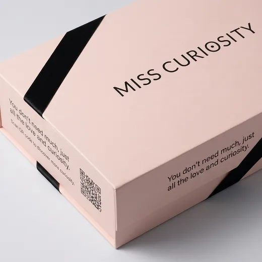 Pale pink matte laminated bra gift box with raised blind embossed branding