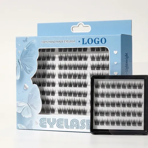 Custom window eyelash carton beside a black tray of segmented false eyelashes
