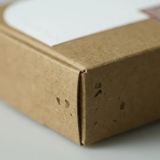 Kraft carton folded edge and score detail