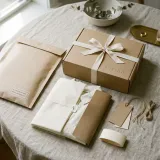 Apparel packaging samples with mailer, sleeve, tissue wrap, and hang tag