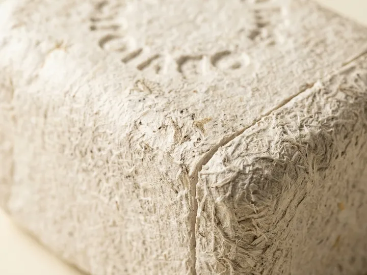 Macro detail of rough agricultural fibers in molded mycelium packaging