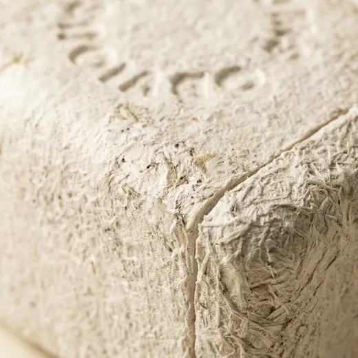 Close view of agricultural fibers in the molded mycelium surface