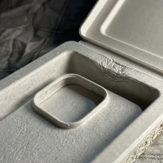 Close-up of molded pulp cavity and hinge construction