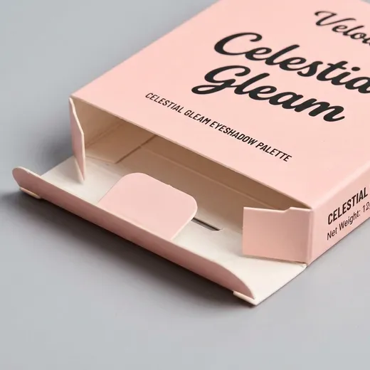Close view of the open locking tuck-end closure on a pink palette carton