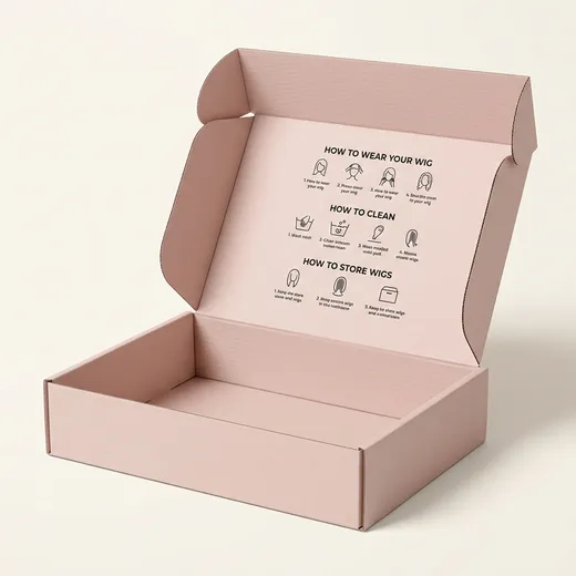 Open pink paperboard wig mailer box showing its hinged lid, side flaps, base, and printed wig care instructions