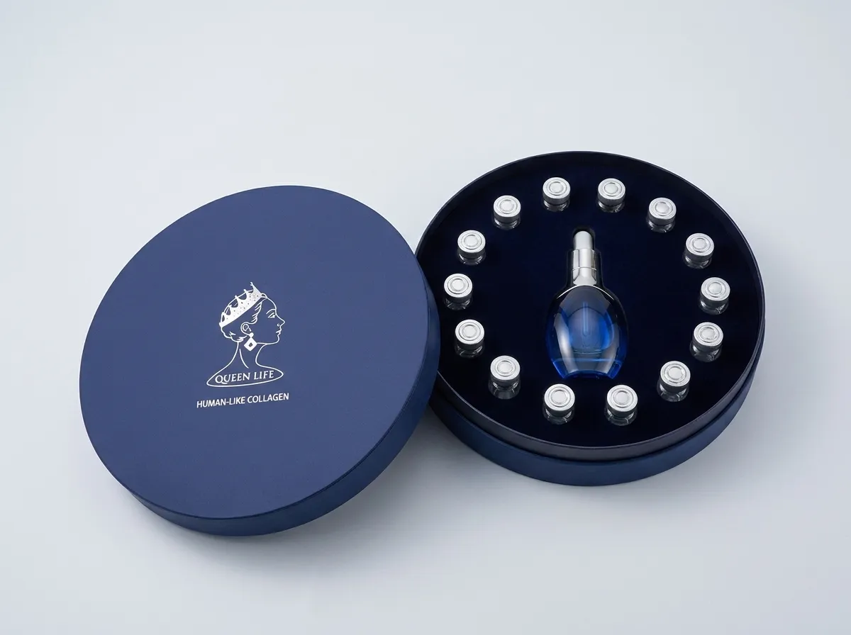 Open custom round rigid PR box with a separate lid and dark blue fitted insert
